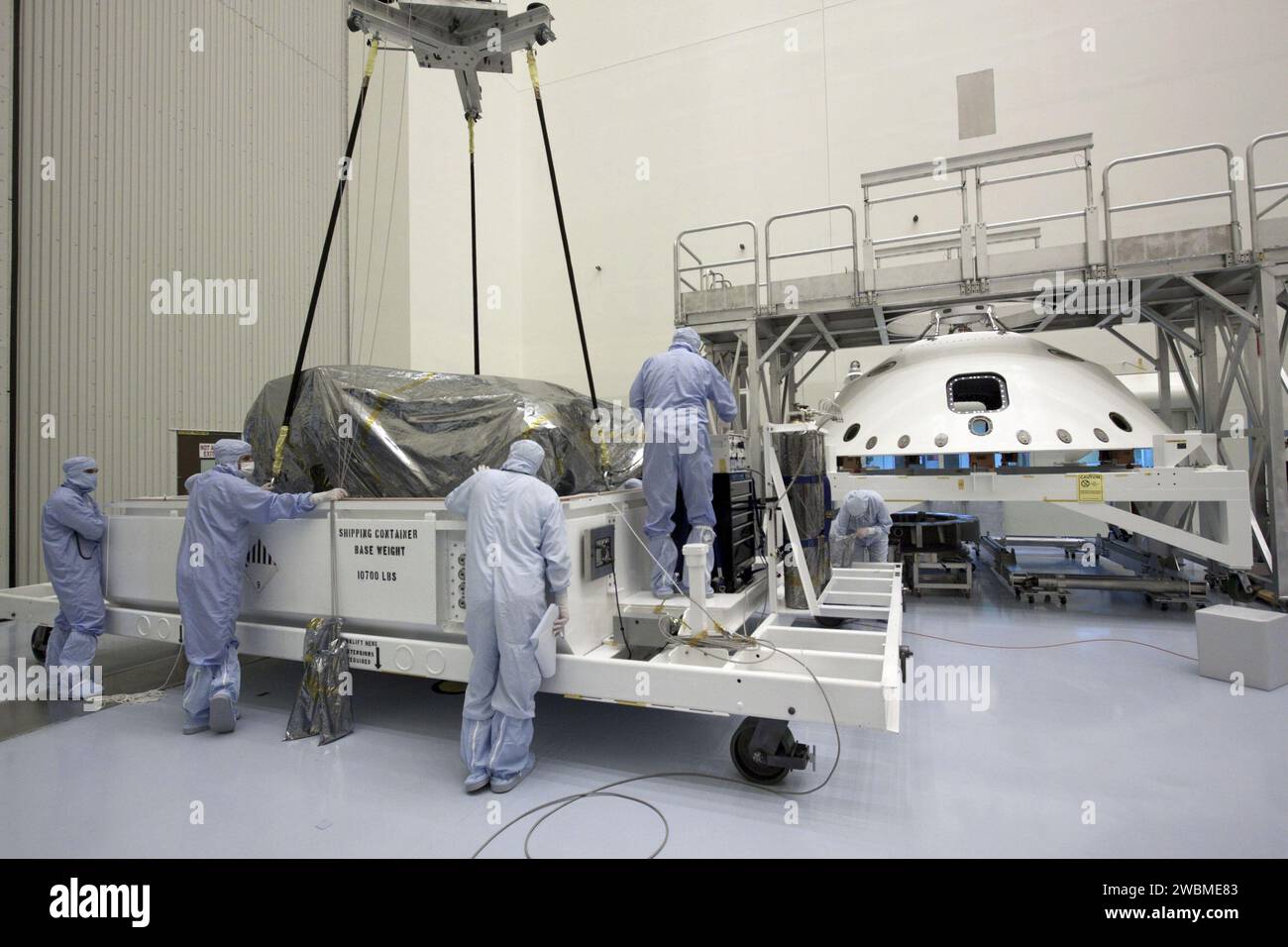 Technicians at Kennedy Space Center used an overhead crane to move NASA ...