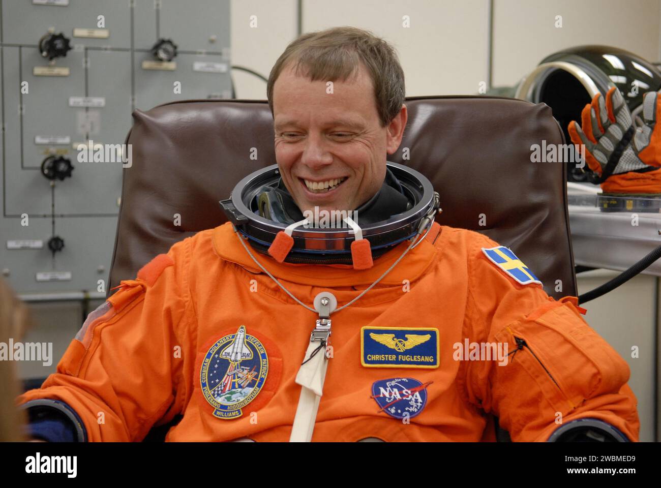 KENNEDY SPACE CENTER, FLA. -- The crew members of mission STS-116 are suiting up for launch at 9 35 p.m. EST from Launch Pad 39B aboard Space Shuttle Discovery. Pictured here is Mission Specialist Christer Fuglesang, who will be making his first shuttle flight. This is Discovery's 33rd mission and the first night launch since 2003. The 20th shuttle mission to the International Space Station, STS-116 carries another truss segment, P5. It will serve as a spacer, mated to the P4 truss that was attached in September. After installing the P5, the crew will reconfigure and redistribute the power gen Stock Photo