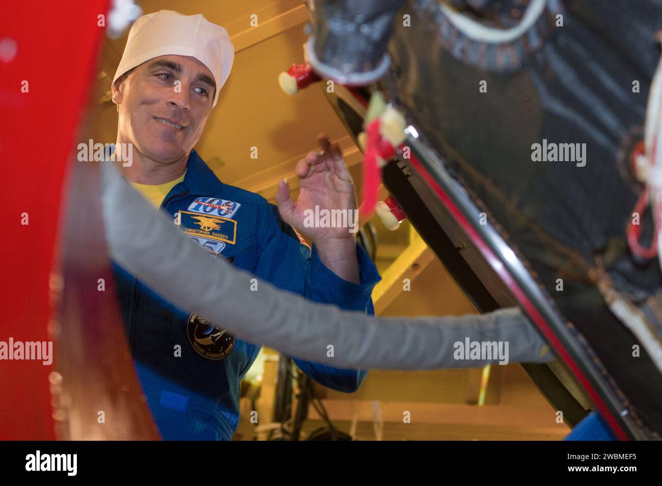 jsc2020e016843 - At the Baikonur Cosmodrome in Kazakhstan, Expedition 63 crewmember Chris Cassidy of NASA prepares to enter the Soyuz MS-16 spacecraft March 25 as part of pre-launch training activities. Cassidy and Anatoly Ivanishin and Ivan Vagner of Roscosmos will launch April 9 on the Soyuz from Baikonur for a six-and-a-half month mission on the International Space Station...Andrey Shelepin/Gagarin Cosmonaut Training Center. Stock Photo