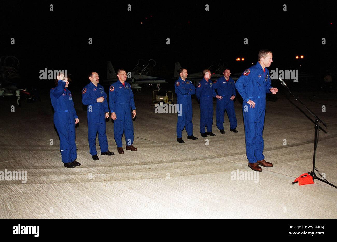 After landing at KSC’s Shuttle Landing Facility, the STS-102 crew pauses to brief the media. At the microphone is Commander James Wetherbee. Standing behind him (left to right) are Missions Specialists Susan Helms, Yury Usachev and James Voss, who are also the Expedition Two crew due to replace Expedition One on the International Space Station; Mission Specialists Paul Richards and Andrew Thomas; and Pilot James Kelly. STS-102 will be carrying the Multi-Purpose Logistics Module Leonardo, the primary delivery system used to resupply and return Station cargo requiring a pressurized environment. Stock Photo