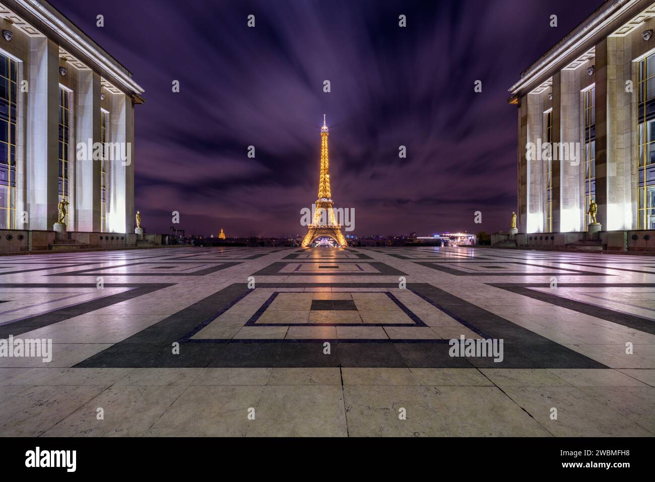 Place du Trocadéro at night with the Eiffel Tower in the background illuminated with a long exposure in Paris, France Stock Photo
