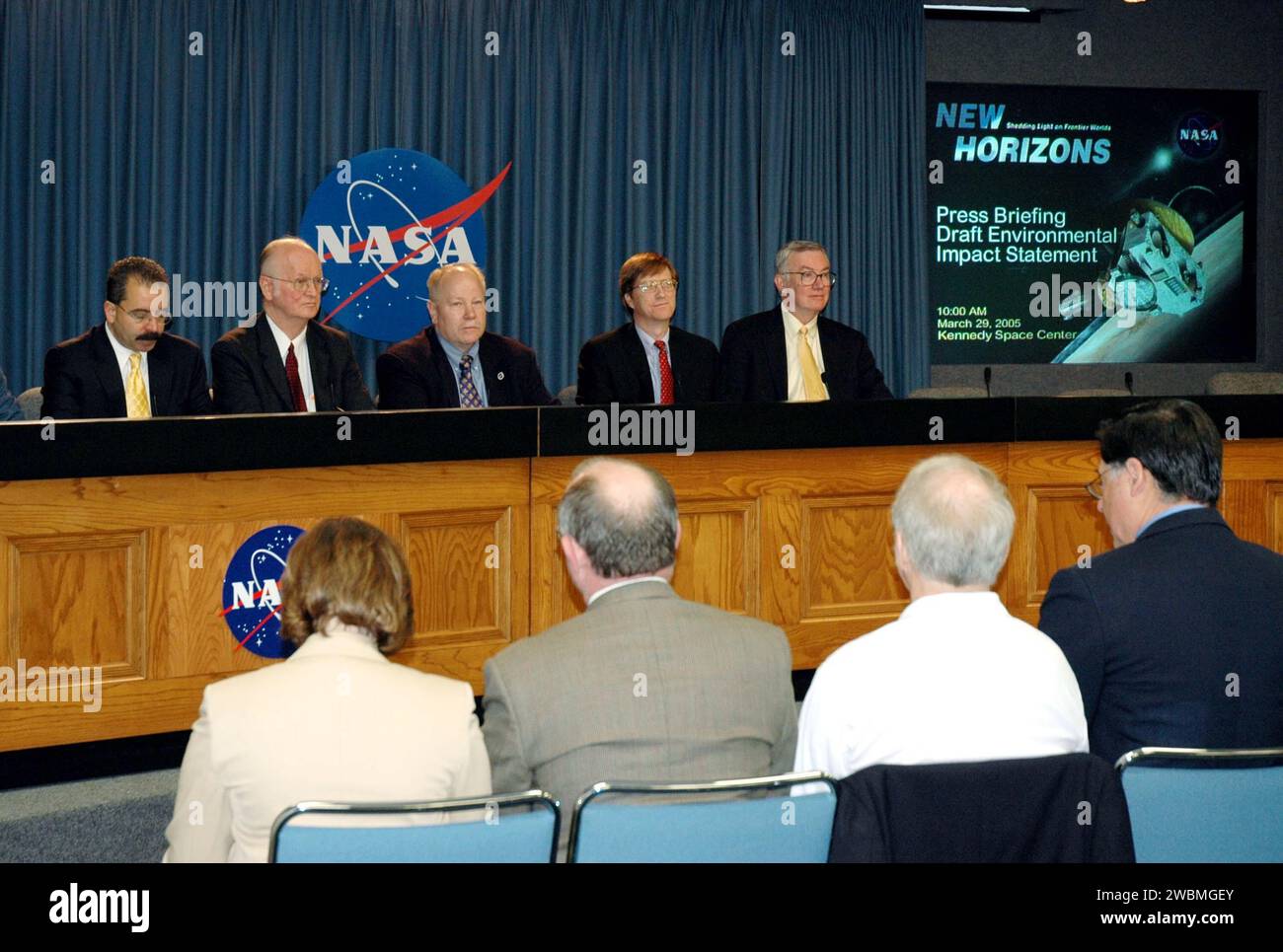 KENNEDY SPACE CENTER, FLA. - Representatives of NASA’s New Horizons Mission to Pluto discuss the mission during a press briefing on the Draft environmental Impact Statement at NASA’s Kennedy Space Center. From left are Orlando Figueroa, deputy association administrator for Programs, Science Mission Directorate; Earl Wahlquist, associate director for Space and Defense Power Systems, Department of Energy, in Germantown, Md.; Kurt Lindstrom, New Horizons Program executive, with NASA; Hal Weaver, New Horizons Project scientist, Johns Hopkins University Applied Physics Laboratory in Laurel, Md.; an Stock Photo