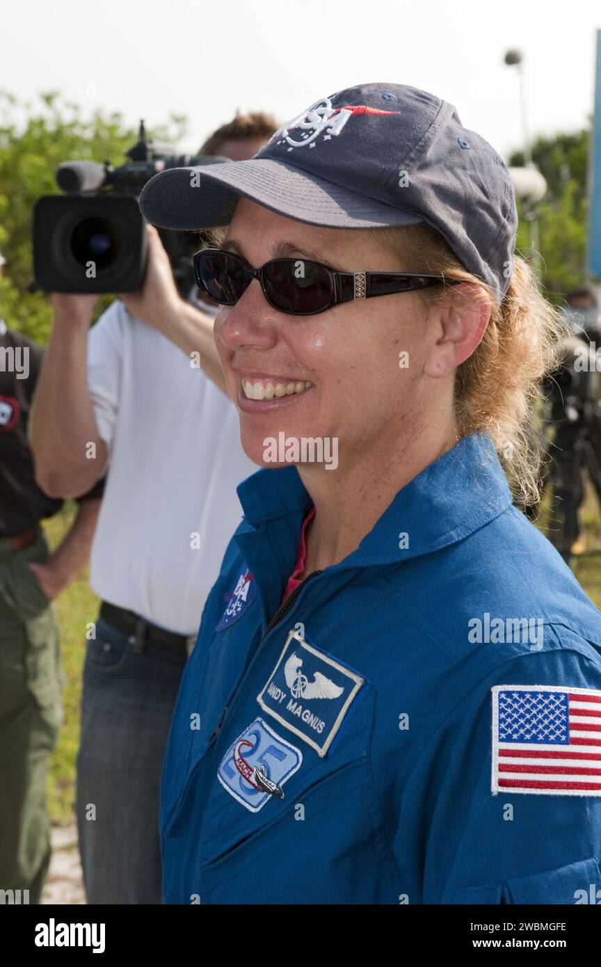 CAPE CANAVERAL, Fla. -- Mission Specialist Sandy Magnus pauses for a photo during M113 armored personnel carrier training at NASA's Kennedy Space Center in Florida. An M113 is kept at the foot of the launch pad in case an emergency exit from the launch pad is needed and every shuttle crew is trained on driving the vehicle before launch. The STS-135 crew is at Kennedy to participate in a launch countdown dress rehearsal called the Terminal Countdown Demonstration Test (TCDT) and related training.    Atlantis and its crew are targeted to lift off July 8, taking with them the Raffaello multi-purp Stock Photo