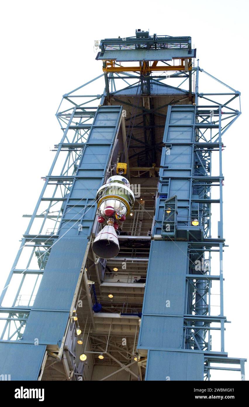 VANDENBERG AFB, CALIF. - The second stage of the Delta II rocket is lifted up the gantry on the launch pad. The Delta II rocket will launch the Aqua-EOS satellite. Aqua is one of a series of spacebased platforms that are central to NASA's Earth Science Enterprise (ESE), a long-term study of the scope, dynamics and implications of global change. The Aqua program is composed of Aqua and other spacecraft (including Terra and Aura) and a data distribution system (ESDIS, and Mission Operations Center Implementation Team). Flying in an orbit that covers the globe every 16 days, Aqua will provide a s Stock Photo