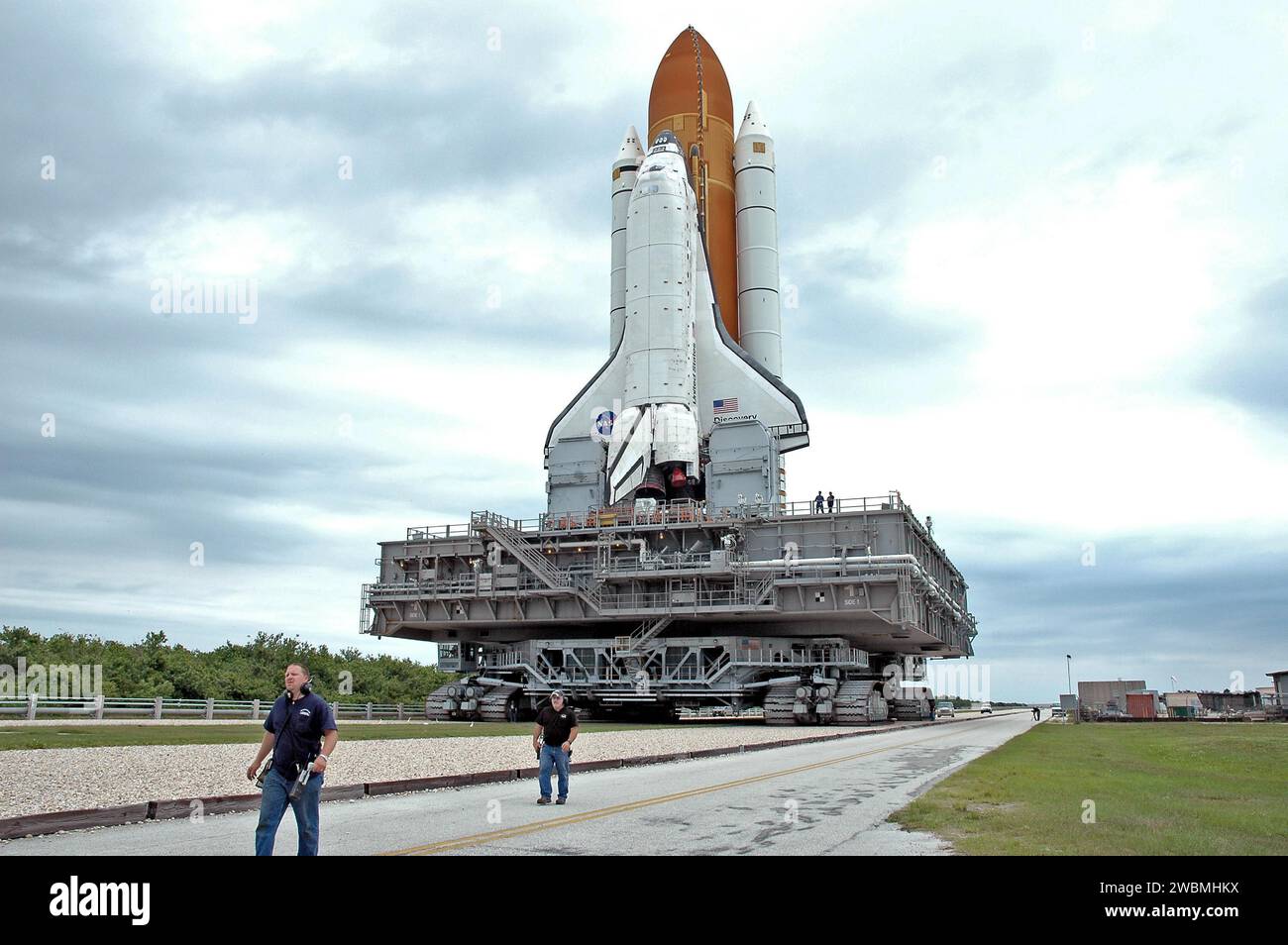 Space Shuttle Discovery is transported on the Mobile Launcher Platform ...