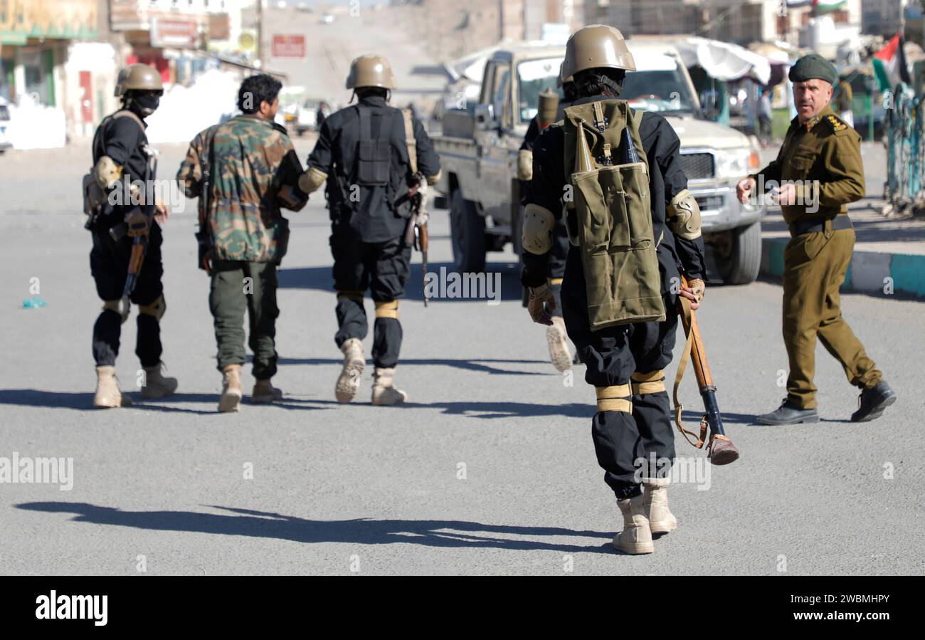 Sanaa, Sanaa, Yemen. 11th Jan, 2024. Houthi troopers walk during