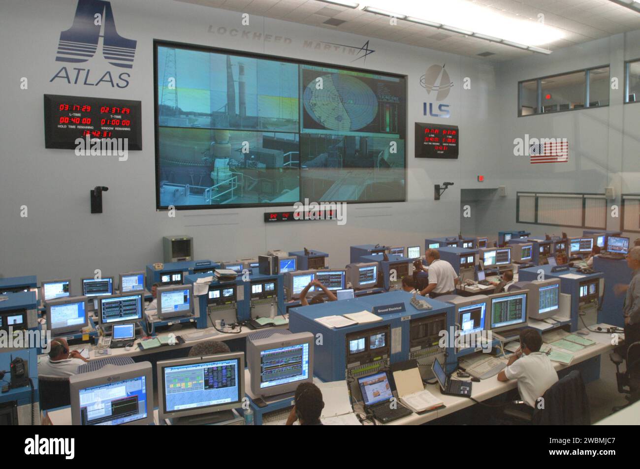 KENNEDY SPACE CENTER, FLA. - At the Atlas V Spaceflight Operations Center, the launch team goes through a wet dress rehearsal for launch of the Mars Reconnaissance Orbiter (MRO), scheduled for Aug. 10. Launch of the MRO aboard an Atlas V rocket will be from Launch Complex 41 at Cape Canaveral Air Force Station in Florida. A wet rehearsal includes pre-liftoff operations and fueling the rocket’s engine. The MRO was built by Lockheed Martin for NASA Jet Propulsion Laboratory in California. It is the next major step in Mars exploration and scheduled for launch from Cape Canaveral Air Force Station Stock Photo