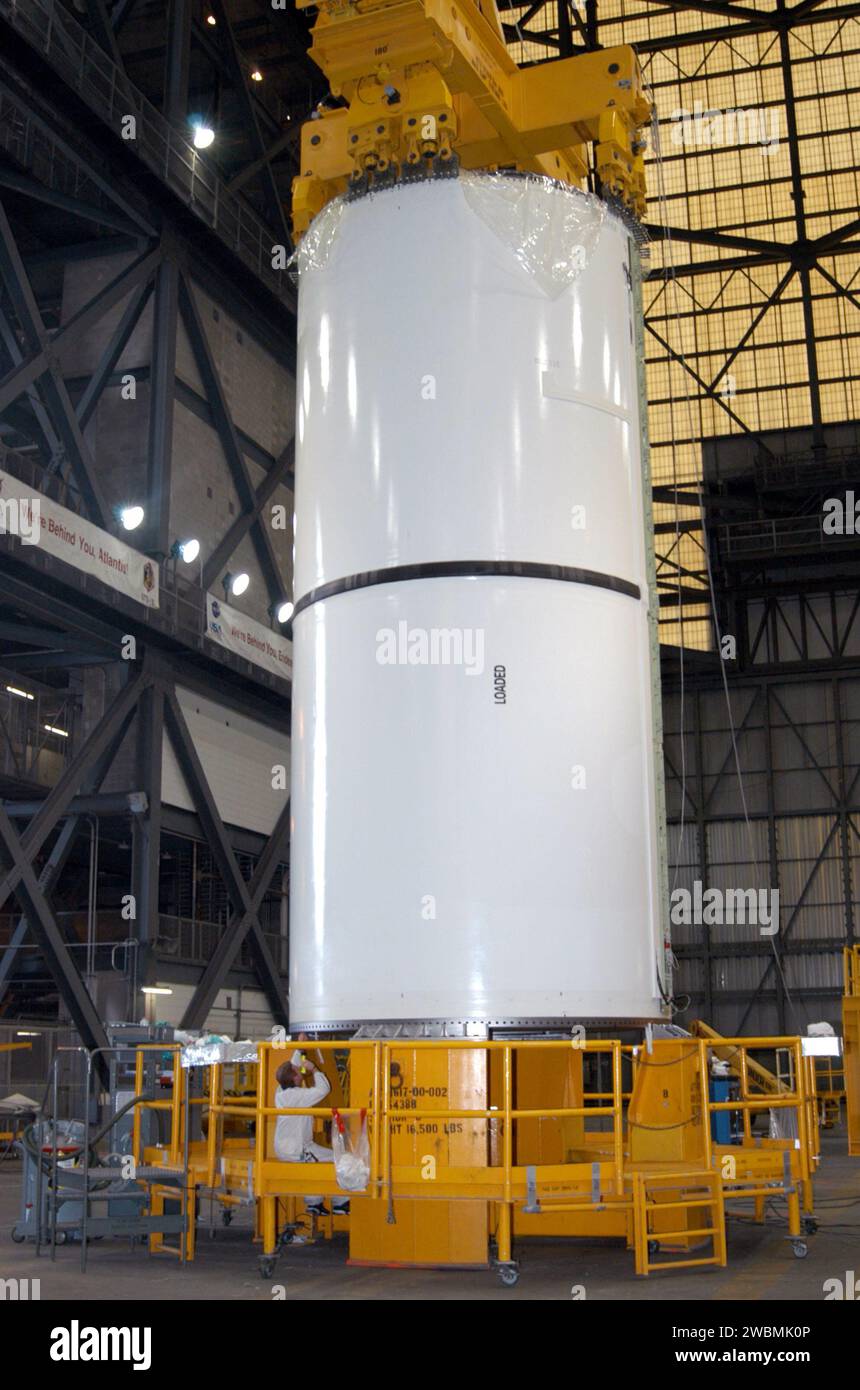 Workers inspect Solid Rocket Booster segments in the Vehicle Assembly ...