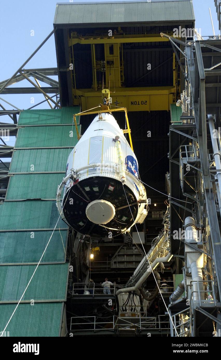The TDRS-I nose fairing nears the top of the launch tower at Pad 36-A ...
