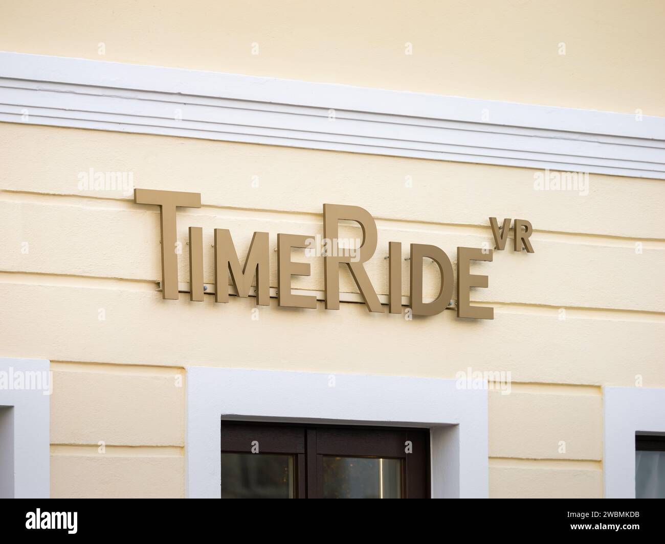 TimeRide logo sign on a building wall. The company offers virtual