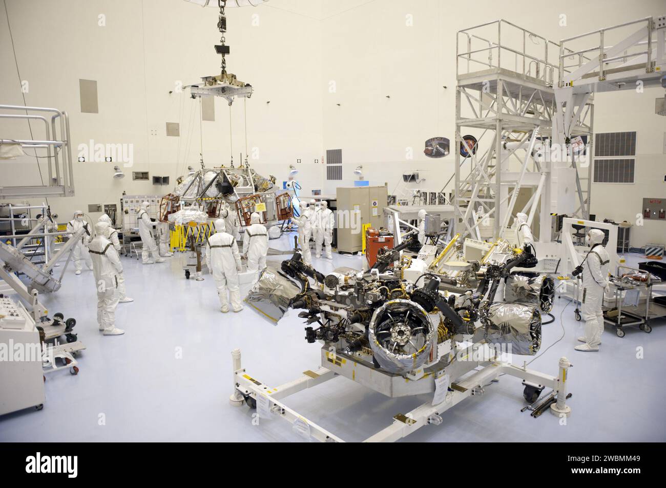 At NASA Kennedy Space Center, technicians at the Payload Hazardous ...