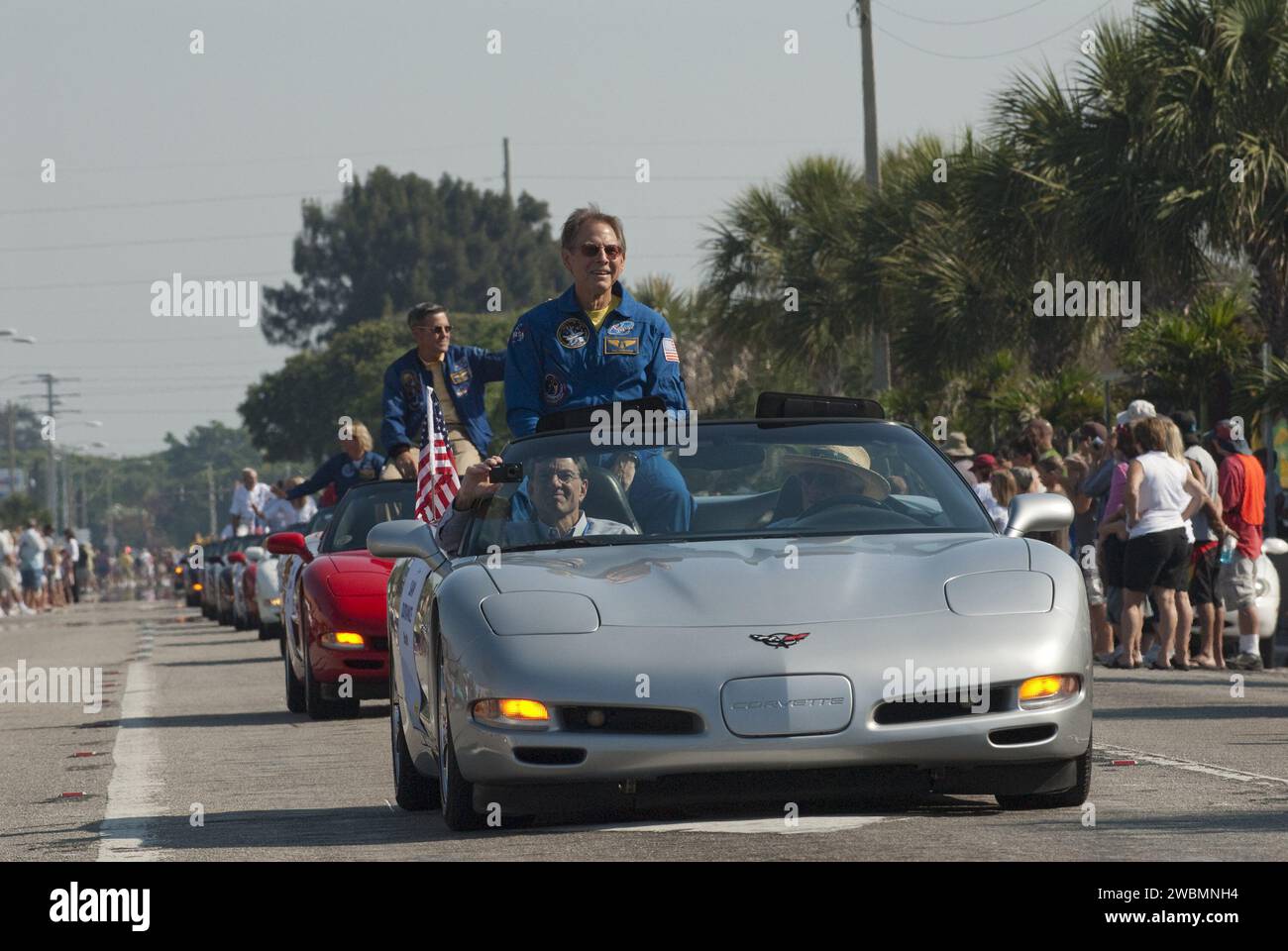 Cape Canaveral, Fla. -- Retired space shuttle astronaut Sam Durrance greets spectators from a Chevrolet Corvette during a commemorative parade in Cocoa Beach, Fla.      A group of current and retired NASA astronauts gathered in Cocoa Beach to commemorate NASA’s 50 years of accomplishments and to honor astronaut Alan Shepard’s Mercury/Freedom 7 suborbital flight May 5, 1961.The event was marked by a parade, with the astronauts riding in a fleet of Chevrolet Corvettes that corresponded with the time period of their space missions. Members of the Cape Kennedy Corvette Club, a group established in Stock Photo