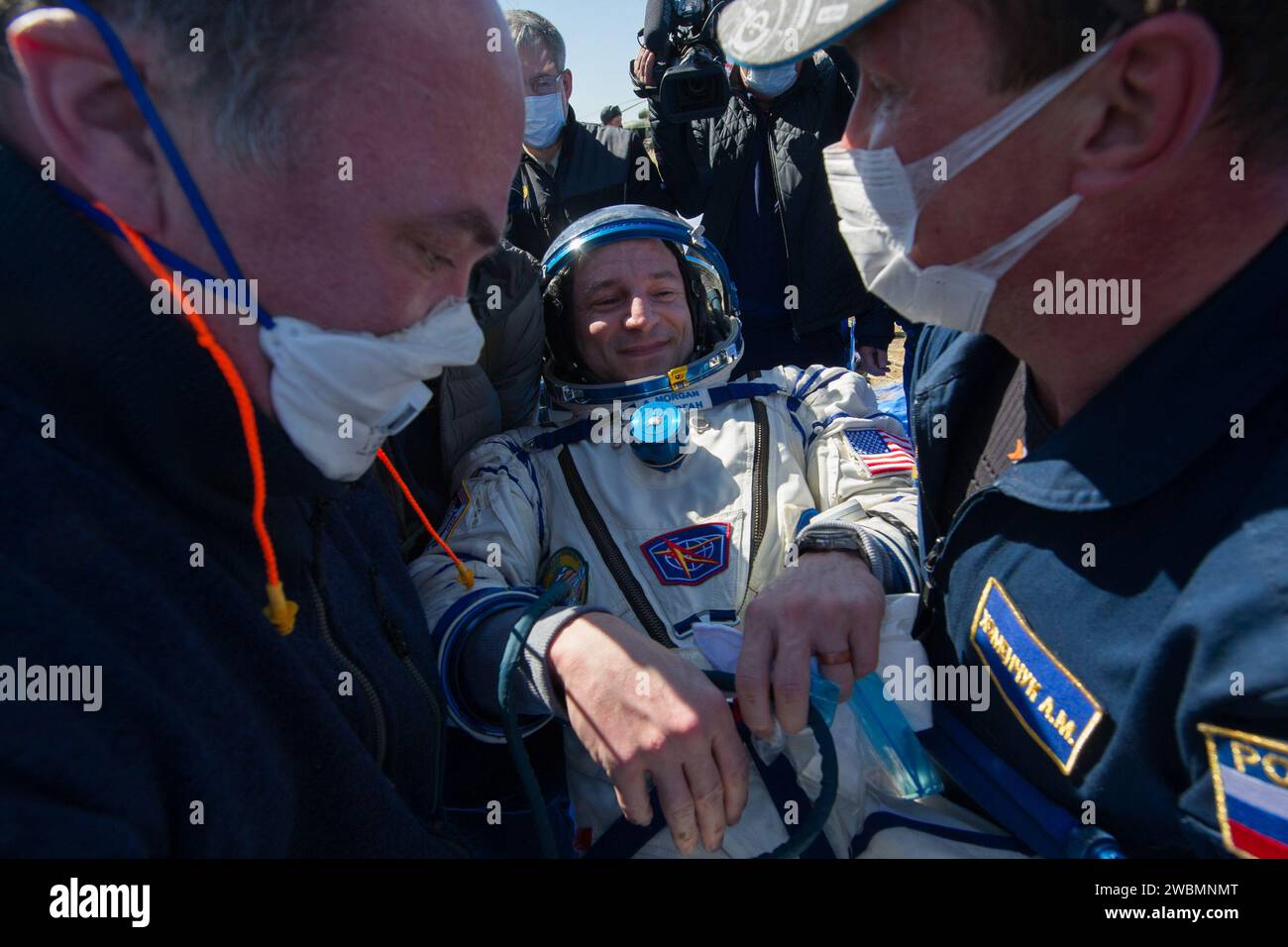 Expedition 62 crew member Andrew Morgan of NASA is helped out of the Soyuz MS-15 spacecraft just minutes after he, Roscosmos cosmonaut Oleg Skripochka, and NASA astronaut Jessica Meir, landed in a remote area near the town of Zhezkazgan, Kazakhstan on Friday, April 17, 2020. Meir and Skripochka returned after 205 days in space, and Morgan after 272 days in space. All three served as Expedition 60-61-62 crew members onboard the International Space Station. Stock Photo