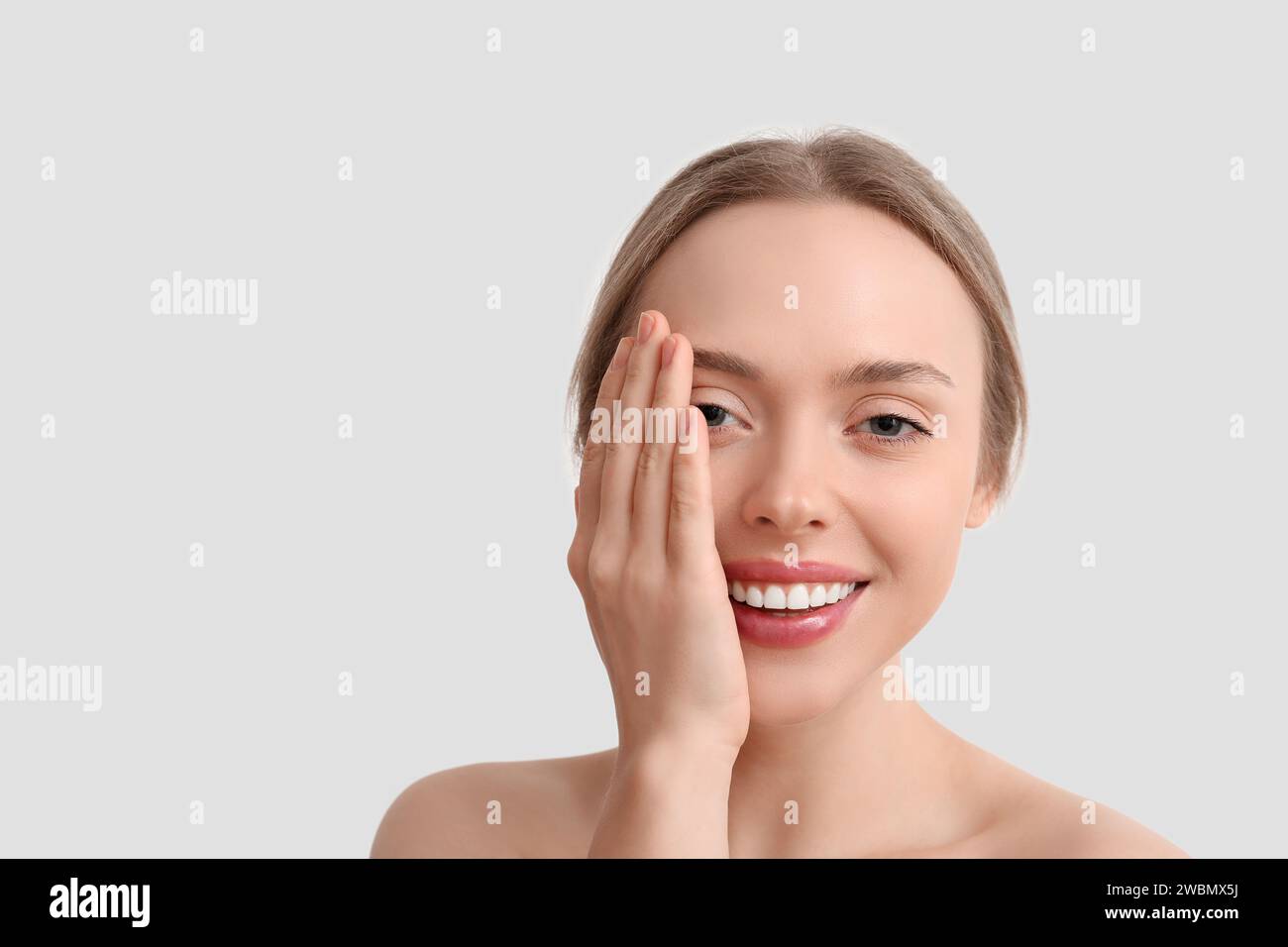 Beautiful young woman on white background Stock Photo - Alamy