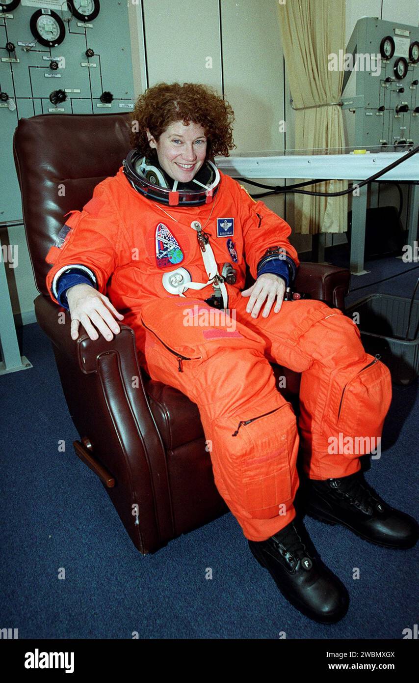 STS-102 Mission Specialist Susan Helms shows her pleasure at the ...