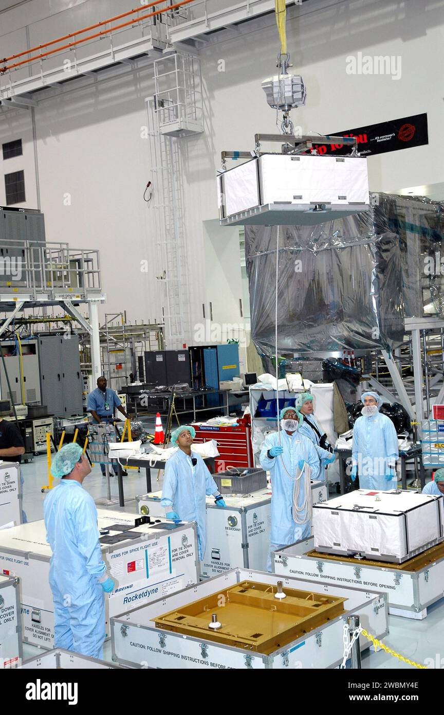 Technicians in Kennedy Space Center’s Space Station Processing Facility ...