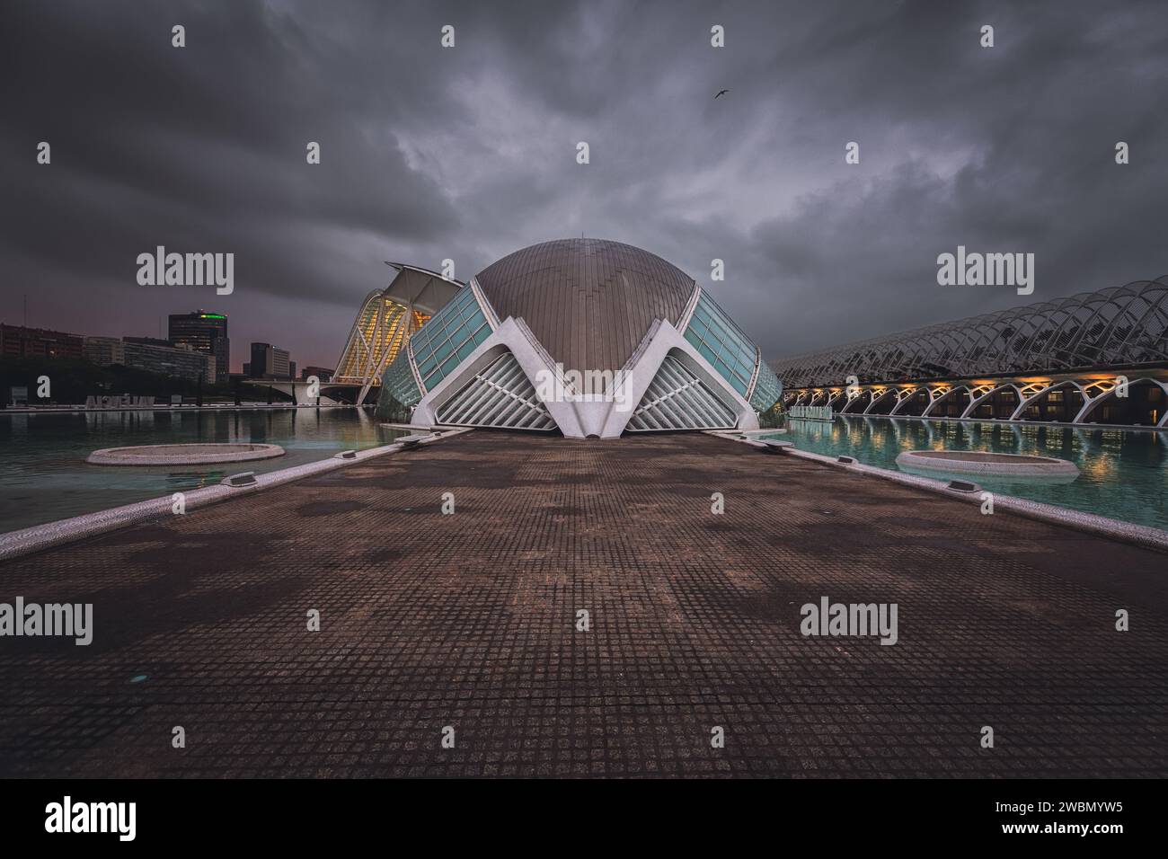The Hemisferic of the City of Arts and Sciences at dawn on a stormy day, in the city of Valencia, Spain. Stock Photo