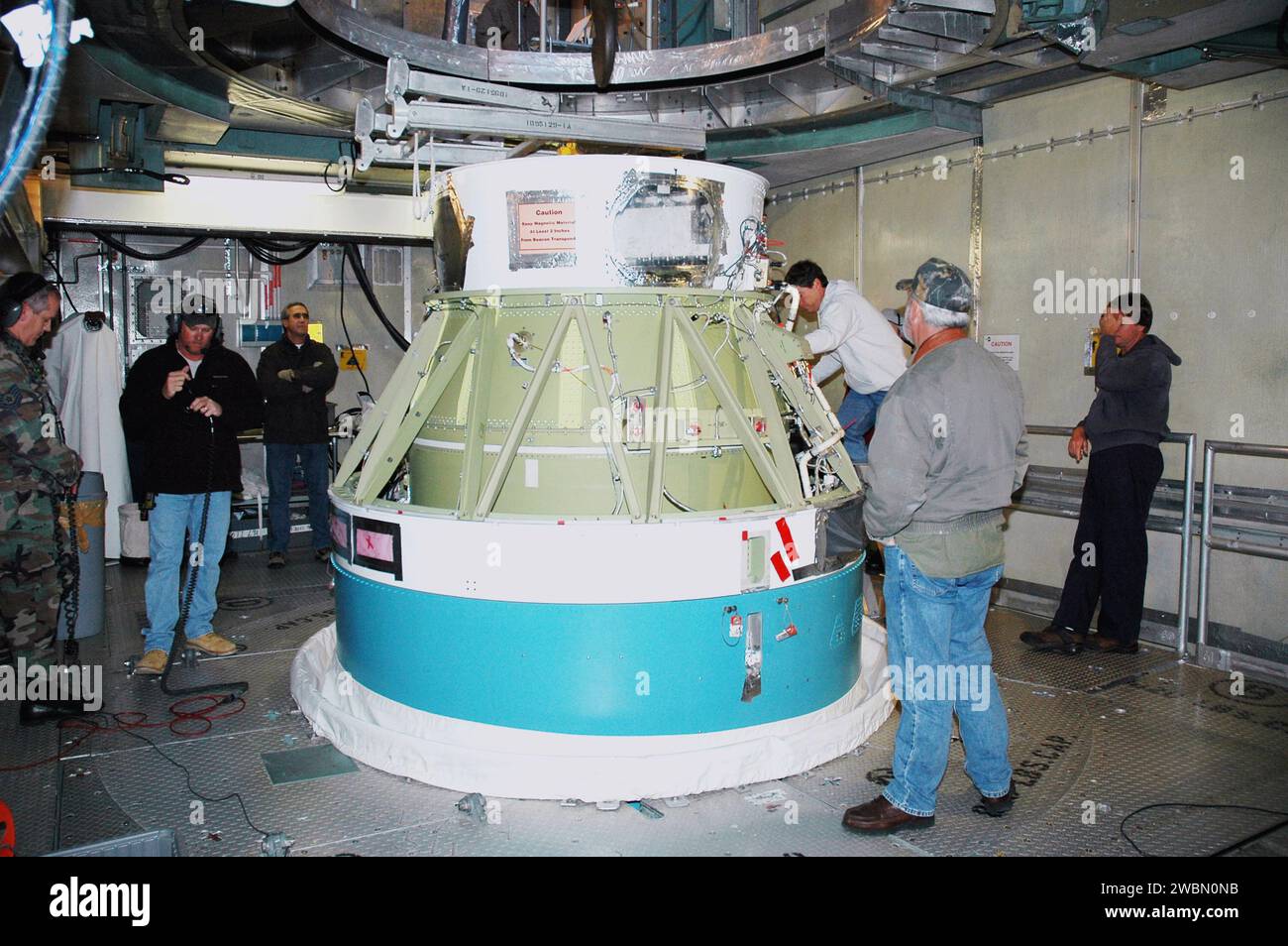 At Launch Pad 17-B’s mobile service tower, Boeing technicians prepare ...