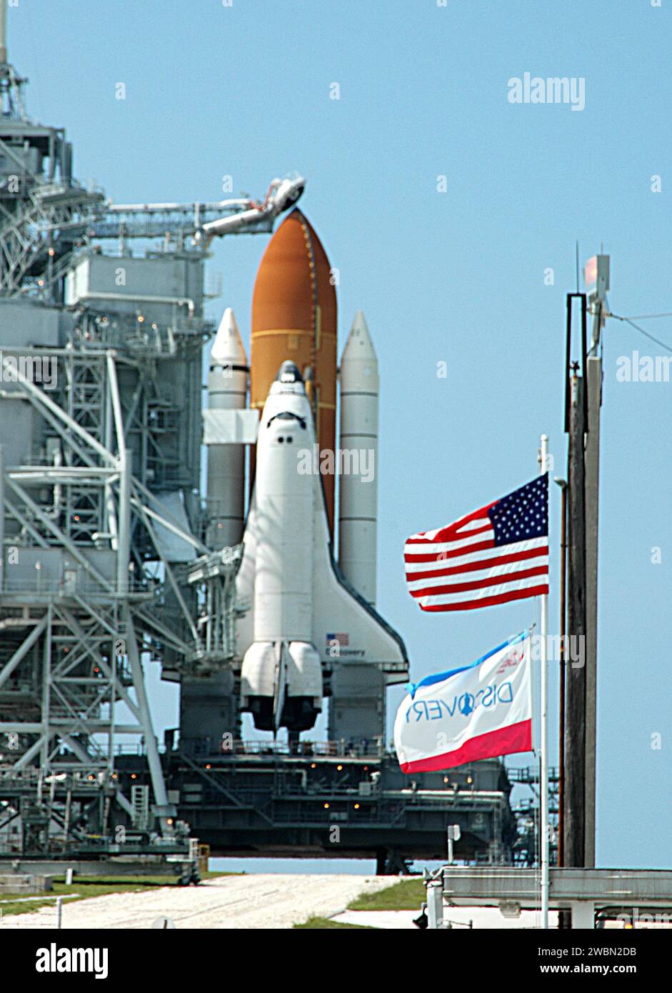 At Kennedy Space Center, Space Shuttle Discovery is positioned on ...