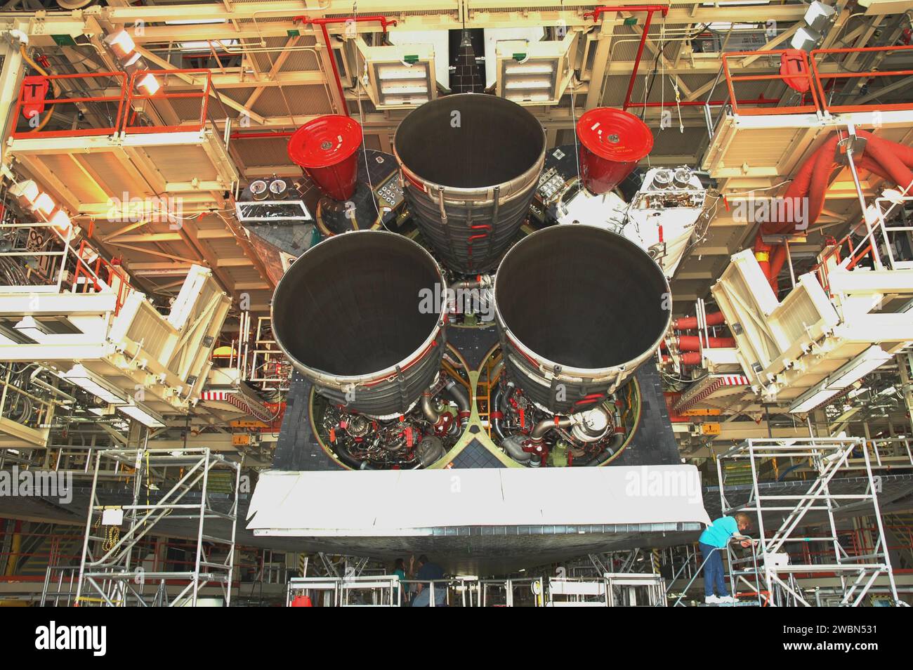The aft section of Space Shuttle Discovery is shown in the Orbiter ...