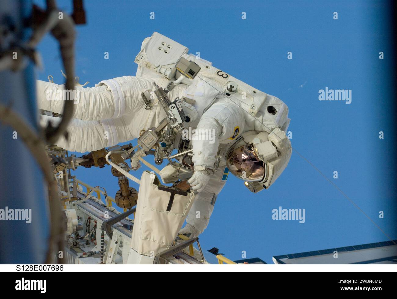 S128-E-007696 (3 Sept. 2009) --- European Space Agency astronaut Christer Fuglesang, STS-128 mission specialist, participates in the mission's second session of extravehicular activity (EVA) as construction and maintenance continue on the International Space Station. During the six-hour, 39-minute spacewalk, Fuglesang and NASA astronaut John “Danny” Olivas (out of frame), mission specialist, installed the new Ammonia Tank Assembly on the Port 1 Truss and stowed the empty tank assembly into the Space Shuttle Discovery’s cargo bay. Stock Photo