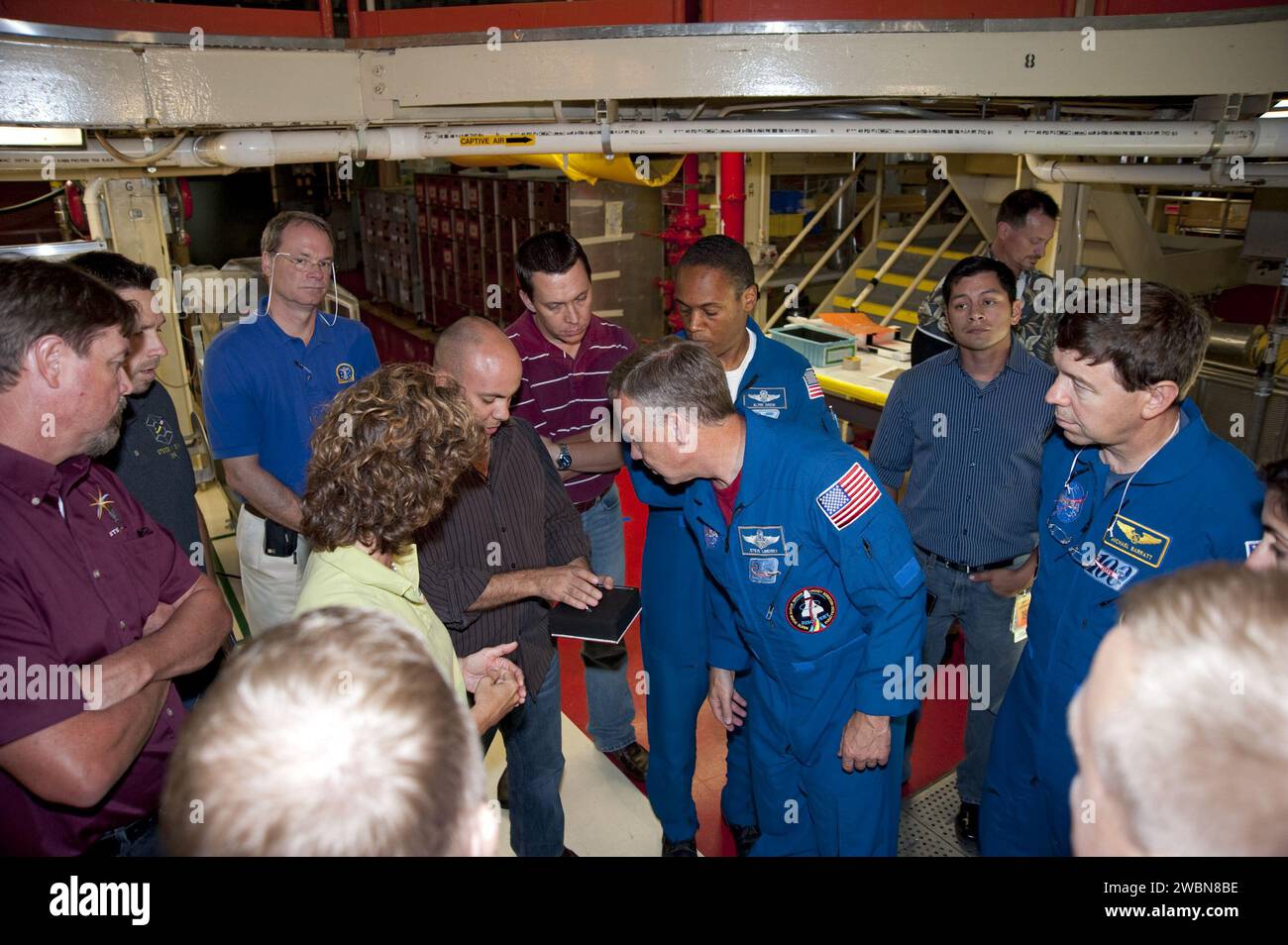 At NASA's Kennedy Space Center, STS-133 astronauts conduct the Crew ...