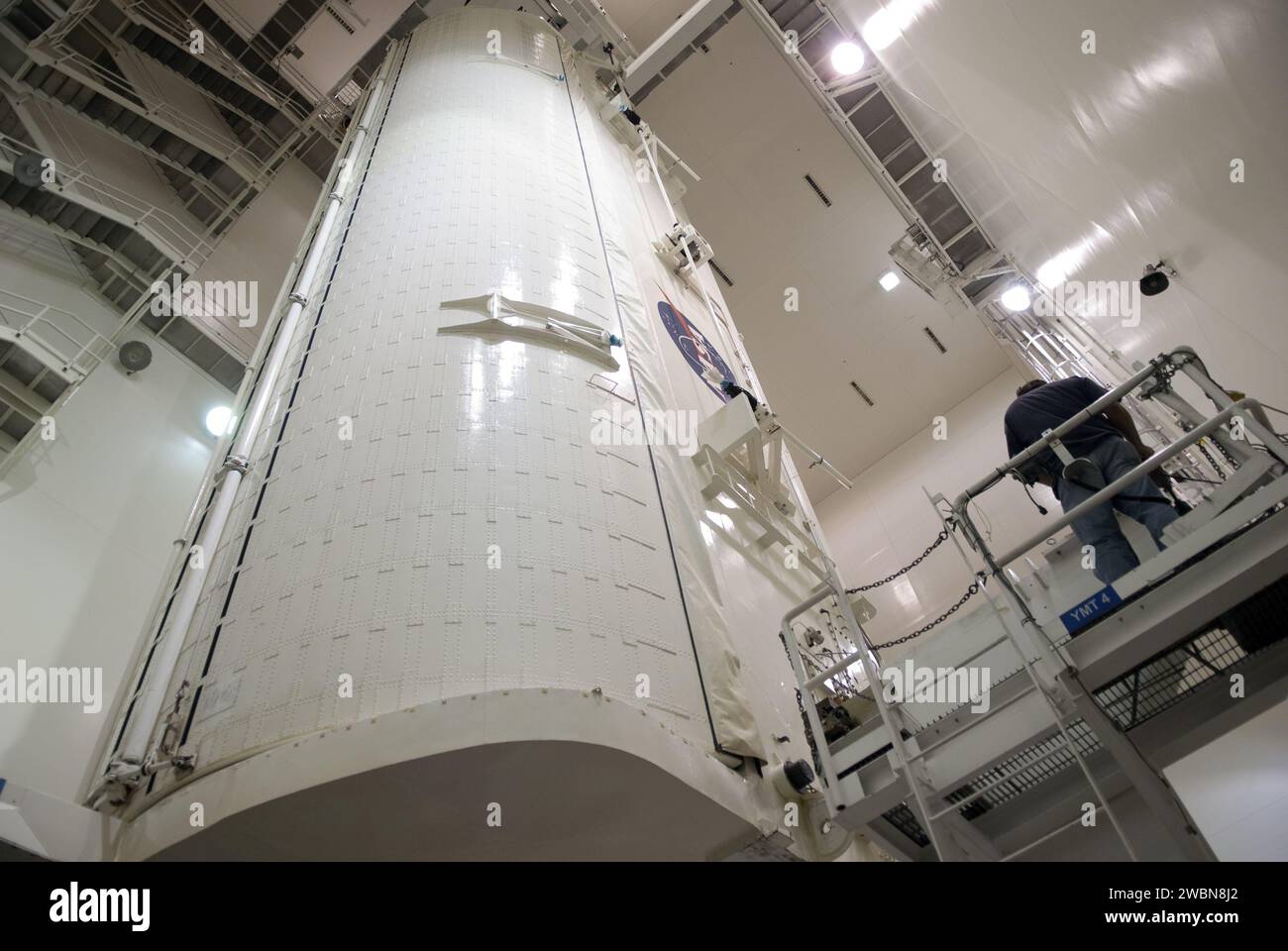 At Kennedy Space Center’s Canister Rotation Facility, the payload ...