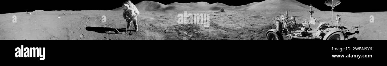 jsc2011e118361 - Panorama view of Apollo 15 lunar module pilot James B. Irwin, using a scoop in making a trench in the lunar soil during the second moonwalk of the mission. The panoramas were built by combining Apollo 15 images starting with frame AS15-92-12420 thru end frame AS15-92-12438. The panoramic images received minimal retouching by NASA imagery specialists, including the removal of lens flares that were problematic in stitching together the individual frames and blacking out the sky to the lunar horizon. These adjustments were made based on observations of the Moon walkers who report Stock Photo