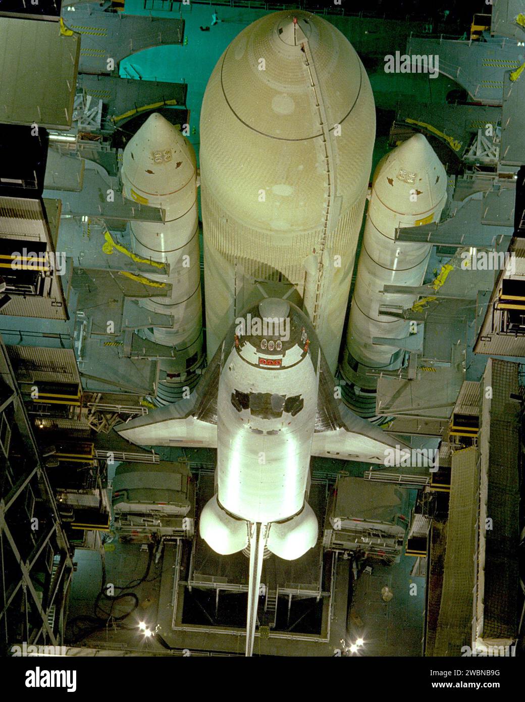 The first Space Shuttle vehicle, Columbia, is mated to its external ...