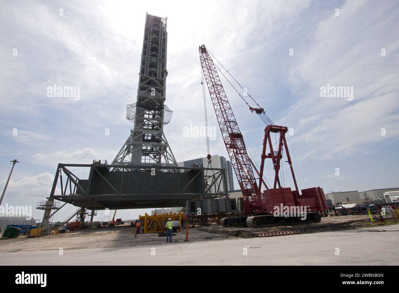 Supervised Lifting Workers at Kennedy Space Center supervised lifting the third segment of ...