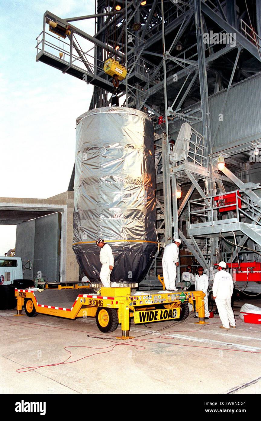 KENNEDY SPACE CENTER, Fla. -- The Microwave Anisotropy Probe (MAP) spacecraft arrives at Launch Complex 17-B, Cape Canaveral Air Force Station. MAP will be lifted up the gantry for final testing and installation of the payload fairing. Launch of MAP via a Boeing Delta II rocket is scheduled for June 30. The launch will place MAP into a lunar-assisted trajectory to the Sun-Earth for a 27-month mission. The probe will measure small fluctuations in the temperature of the cosmic microwave background radiation to an accuracy of one millionth of a degree. These measurements should reveal the size, m Stock Photo