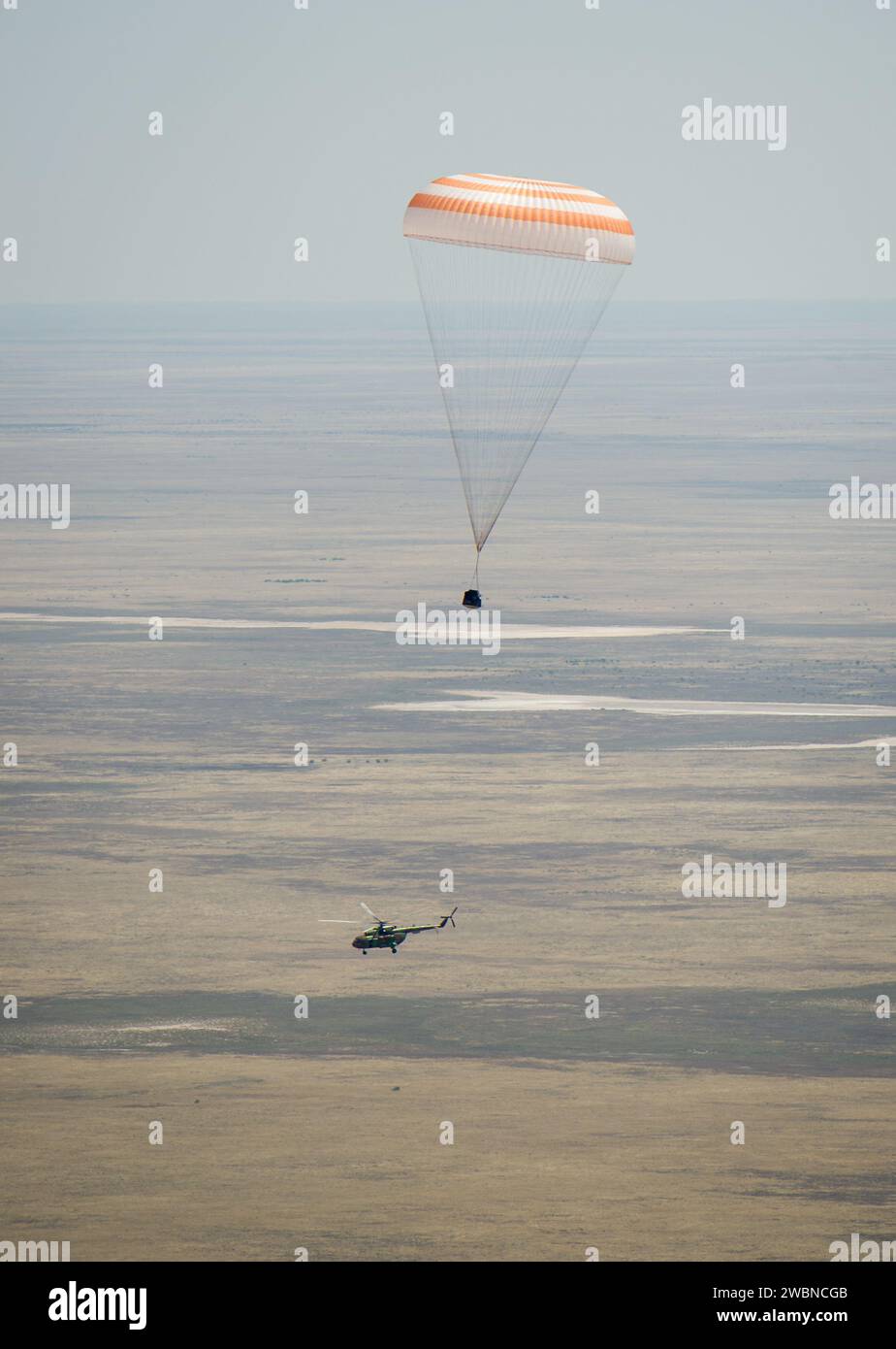 The Soyuz TMA-03M spacecraft is seen as it lands with Expedition 31 Commander Oleg Kononenko of Russia and Flight Engineers Don Pettit of NASA and Andre Kuipers of the European Space Agency in a remote area near the town of Zhezkazgan, Kazakhstan, on Sunday, July 1, 2012.  Pettit, Kononenko and Kuipers returned from more than six months onboard the International Space Station where they served as members of the Expedition 30 and 31 crews. Stock Photo