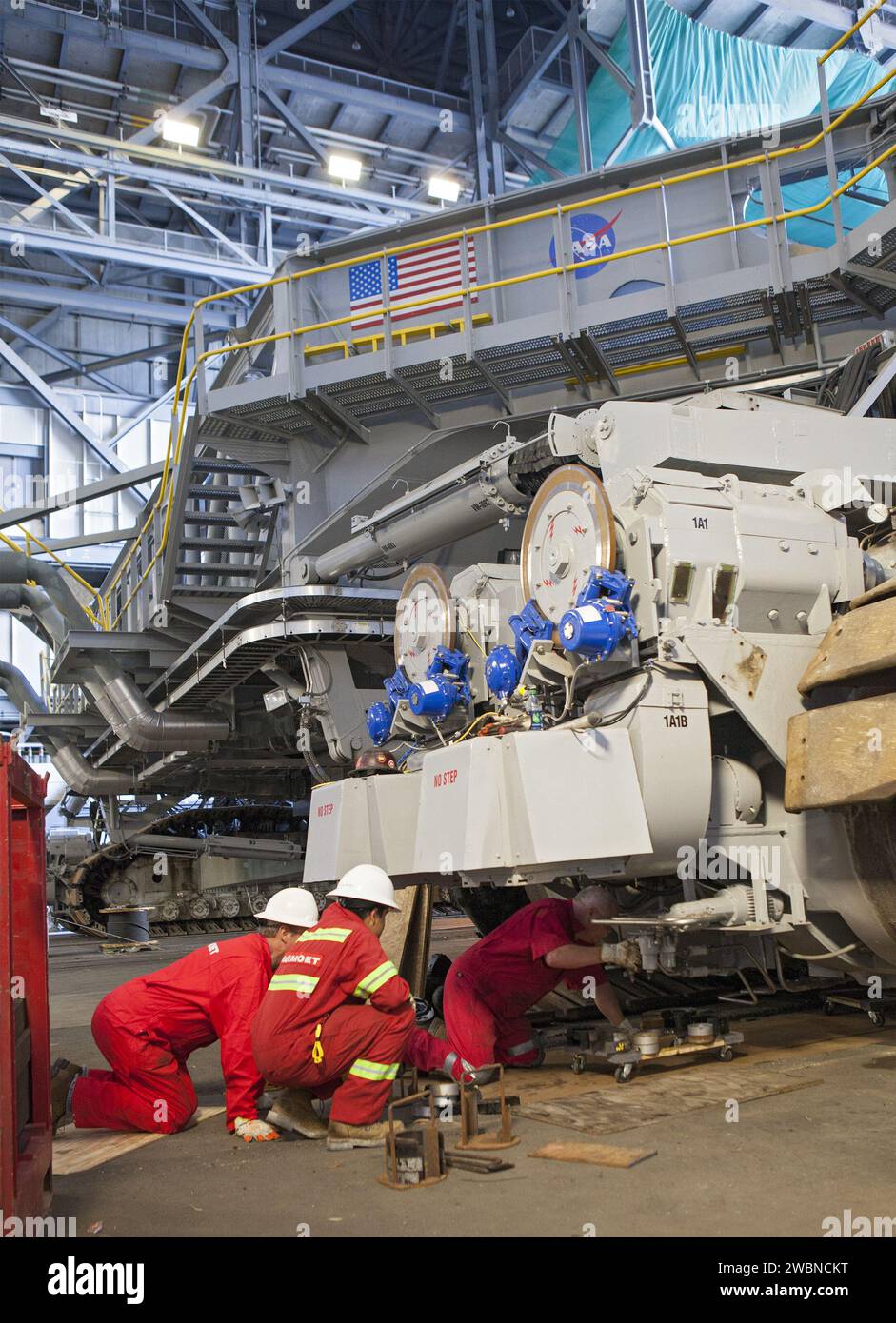 Rocket Inspection CAPE CANAVERAL, Fla. -- Technicians in the Vehicle Assembly Building at ...