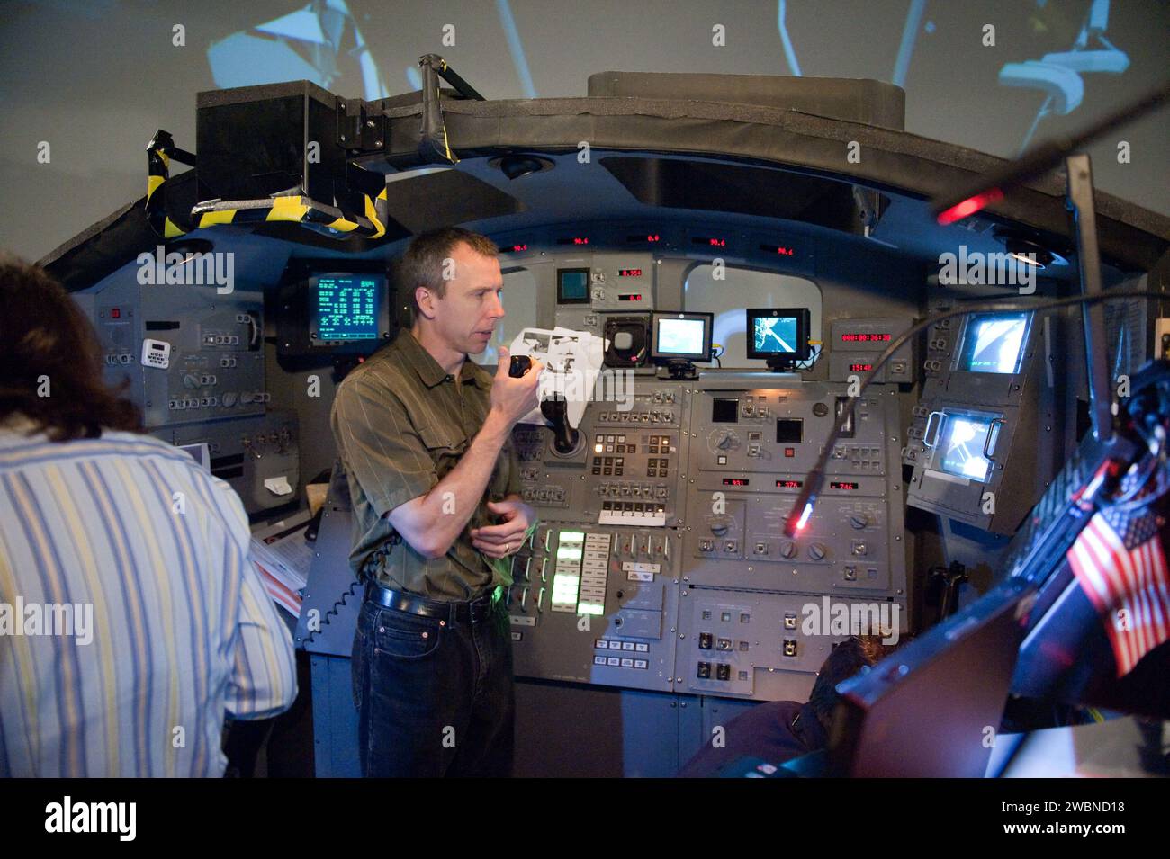 JSC2011-E-028170 (23 March 2011) --- NASA astronaut Andrew Feustel, STS-134 mission specialist, participates in an exercise in the systems engineering simulator in the Avionics Systems Laboratory at NASA's Johnson Space Center. The facility includes moving scenes of full-sized International Space Station components over a simulated Earth. Stock Photo