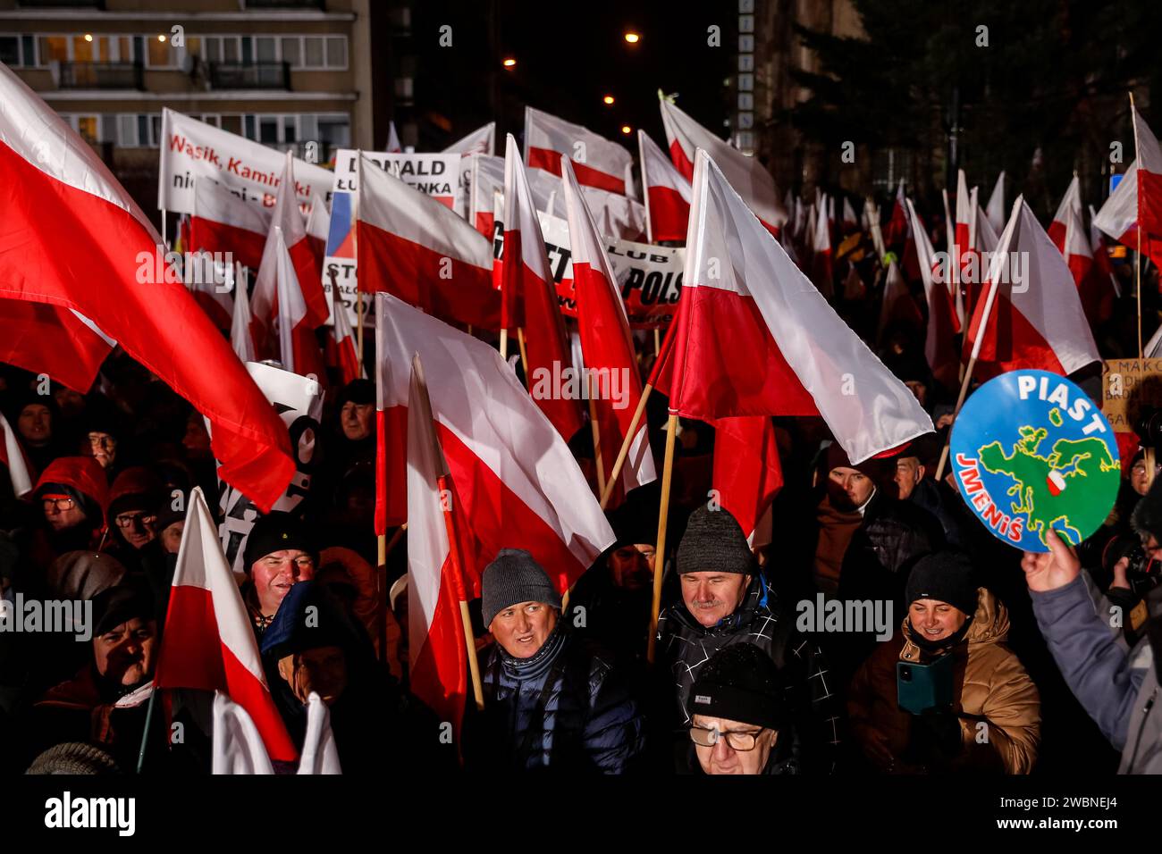Warsaw, Poland, 11th of January 2024. Crowds of people, holding Polish