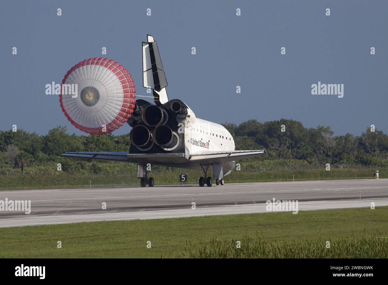 CAPE CANAVERAL, Fla. - With its drag chute unfurled, space shuttle ...