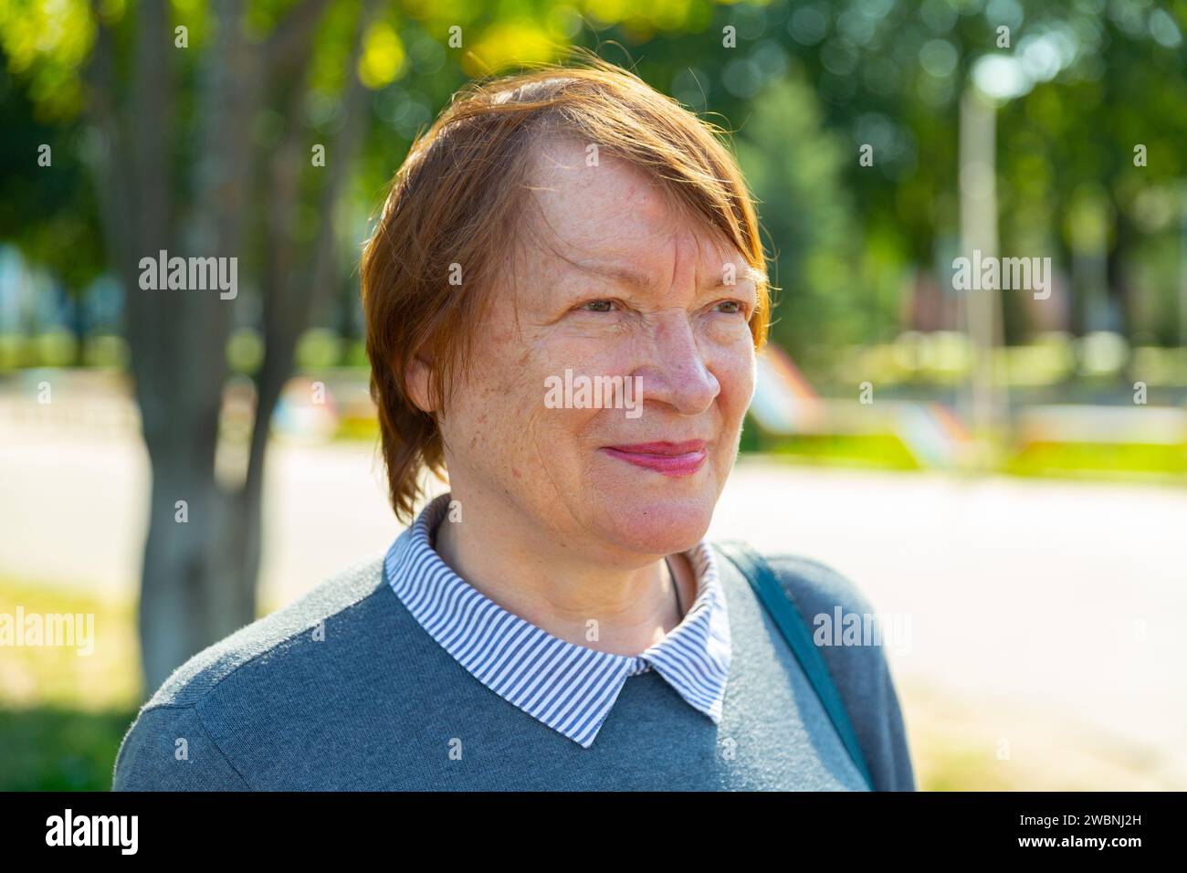 Portrait of a smiling mature woman Stock Photo - Alamy