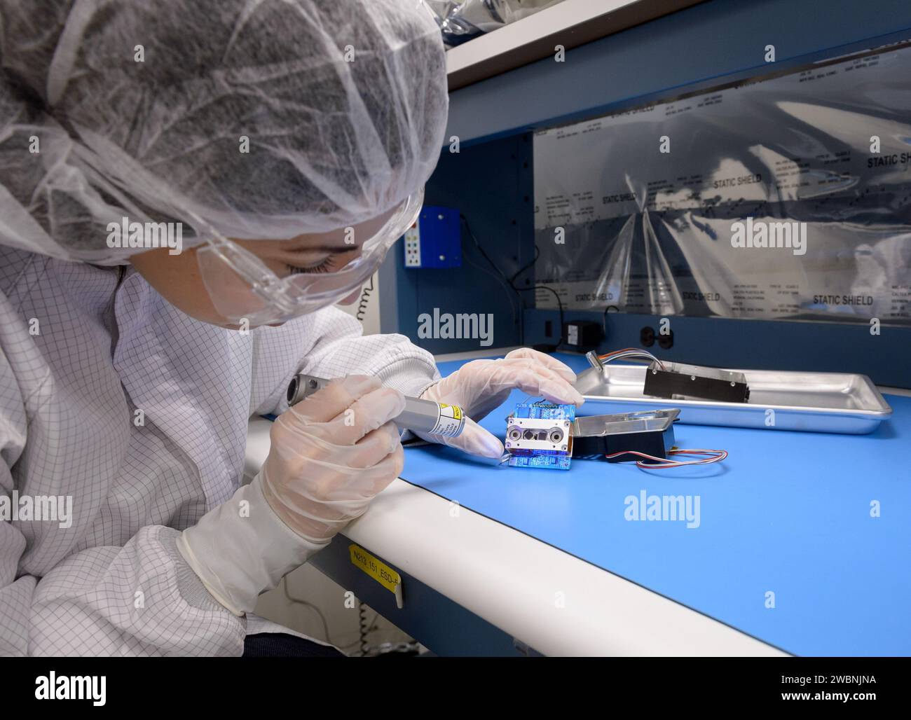 scientist testing near infrared LED device Targeting Cancer with Precision
