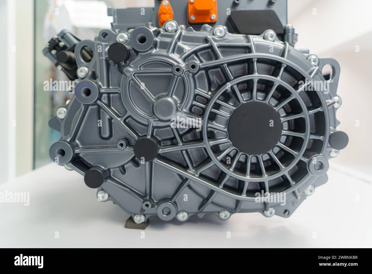 Powerful engine motor beneath the hood of an electric vehicle (EV). This glimpse captures the advanced technology driving the eco-friendly revolution, Stock Photo