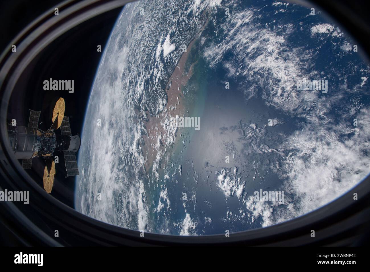 From SpaceX Crew Dragon, the ISS is pictured above the Atlantic Ocean ...