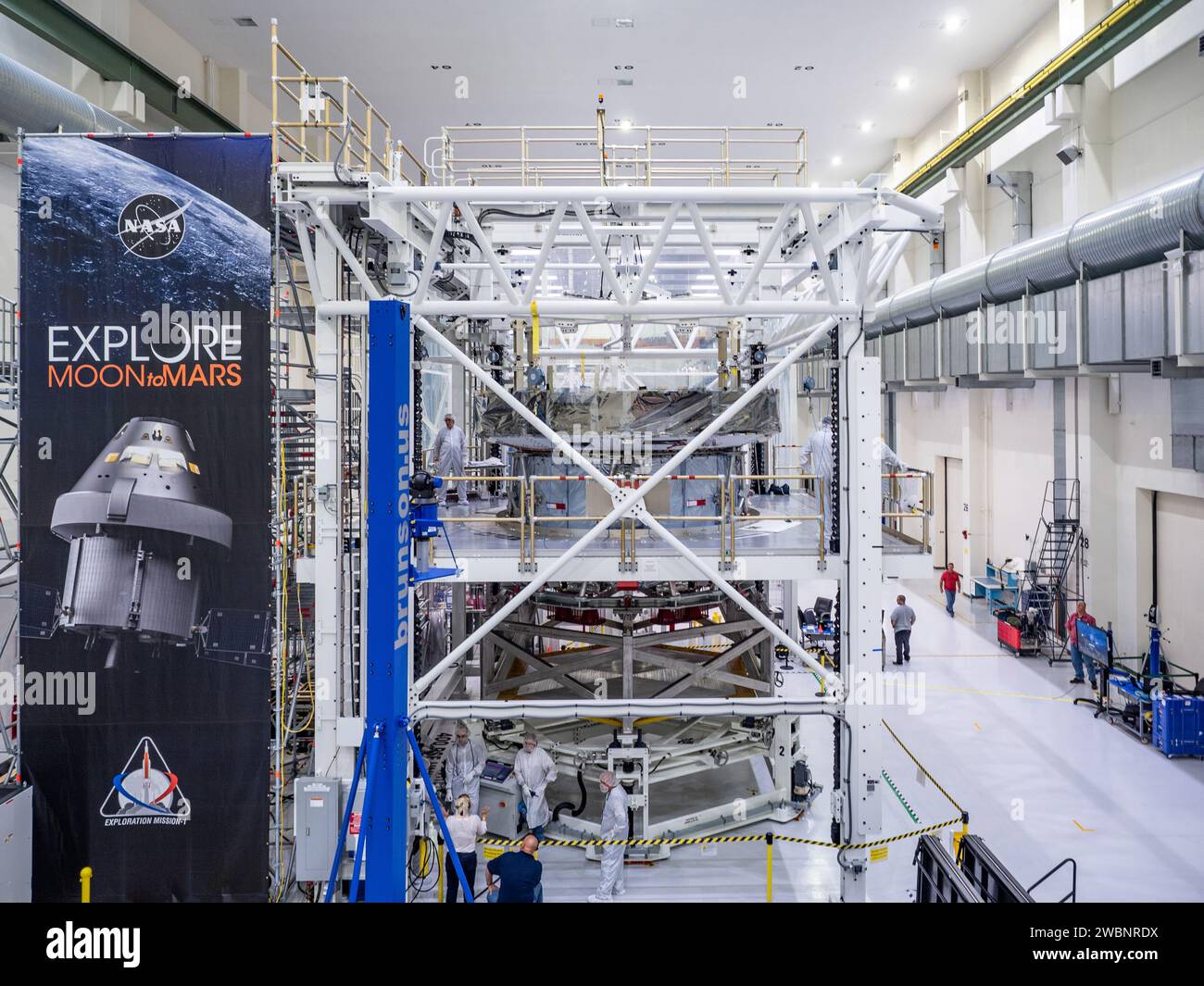 Technicians from Lockheed Martin at Kennedy Space Center mate Orion's ...
