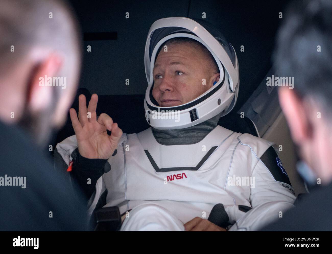 Eressing Douglas Hurley gives the OK sign before egressing SpaceX Crew Dragon ...