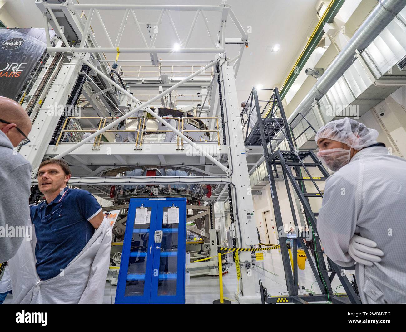 Lockheed Martin technicians at Kennedy Space Center mate Orion's crew ...