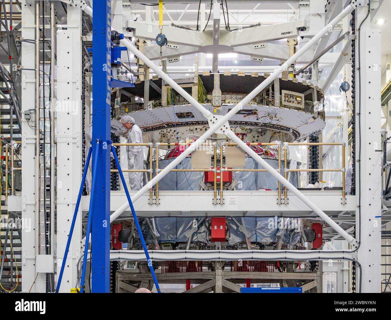 Lockheed Martin technicians assemble Orion's crew module adapter with ...