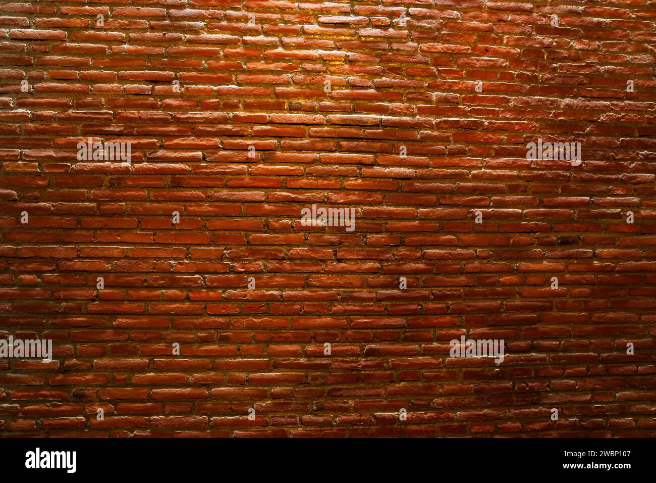 The red brick wall seen perspective from the front side for background Stock Photo