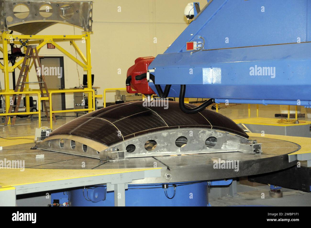 A 7-axis milling machine performs a rough cut on the second quarter ...