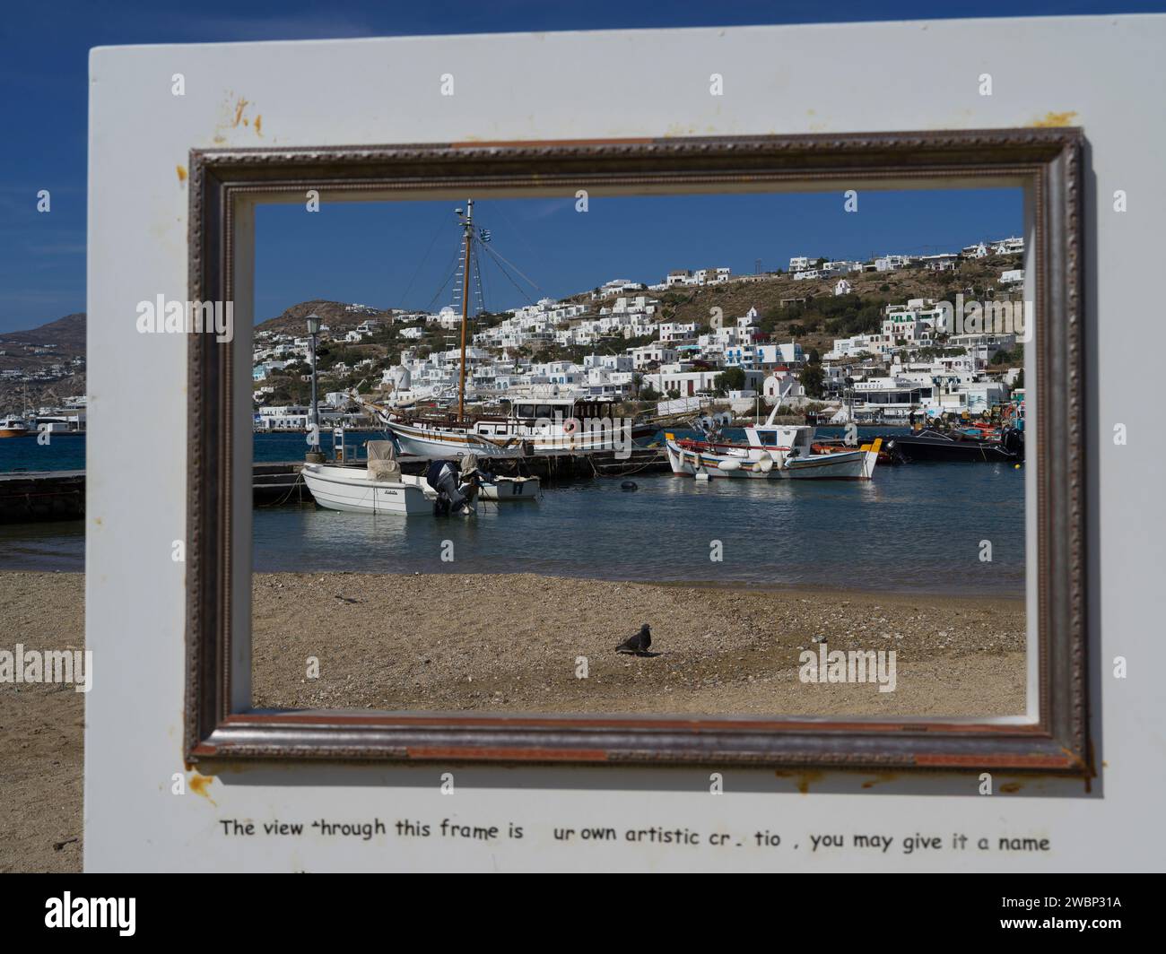 Framed image of boats in a harbor along the Mykonos Island coastline, Greece Stock Photo