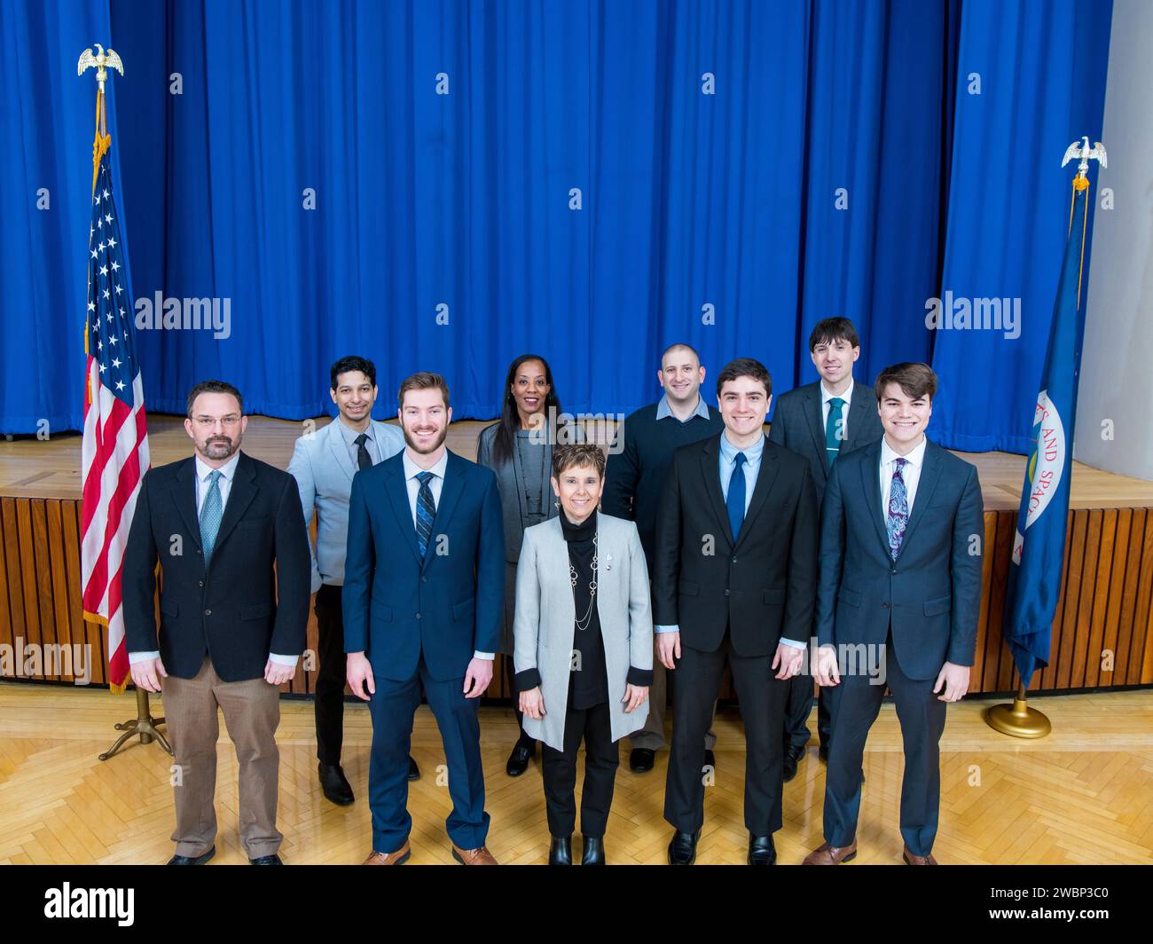 Newly hired employees participated in a swearing-in ceremony, taking ...