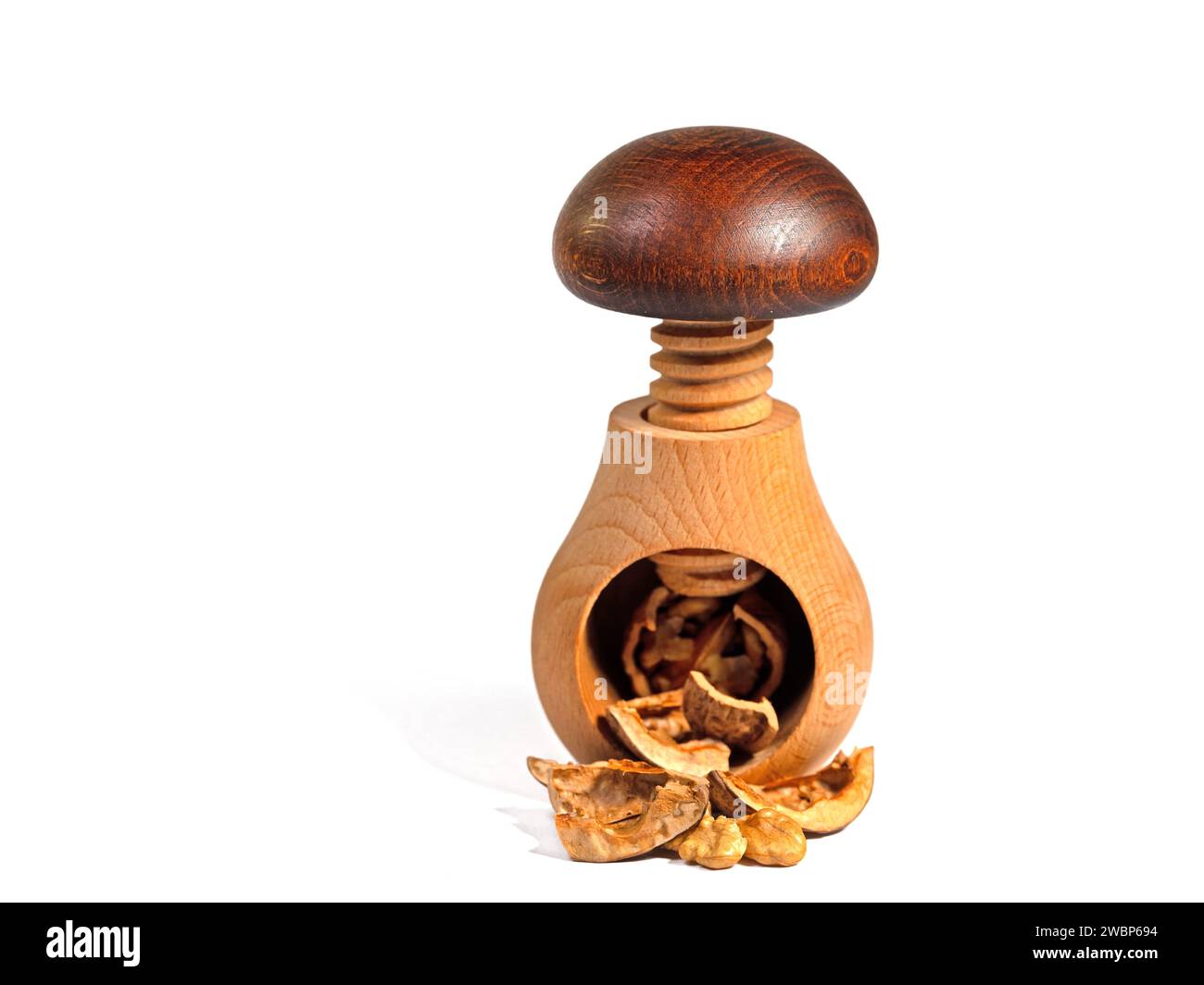 Walnut and nutcracker in a close-up Stock Photo