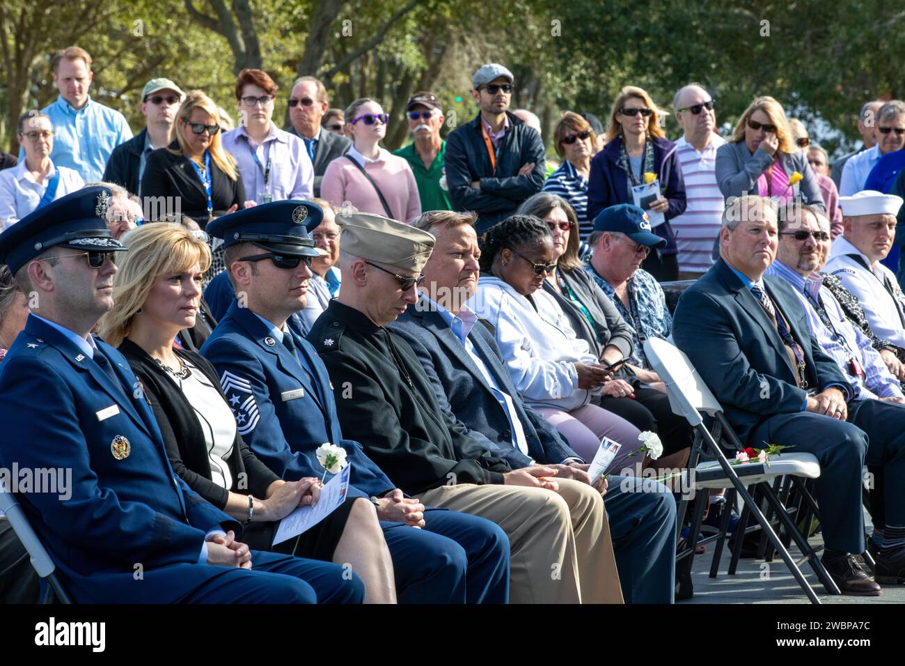 The audience looks on during the NASA Day of Remembrance ceremony at the Space Mirror Memorial in the Kennedy Space Center Visitor Complex on Jan. 30, 2020. The crews of Apollo 1 and space shuttles Challenger and Columbia, as well as other fallen astronauts who lost their lives in the name of space exploration and discovery, were honored at the annual event. Stock Photo